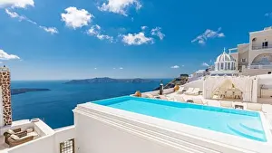 Romantic holidays Santorini resorts with infinity pool and sea view. Amazing summer travel landscape and white architecture, honeymoon destination