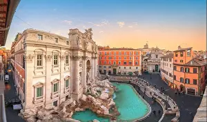 Rome, Italy cityscape overlooking Trevi Fountain at dawn