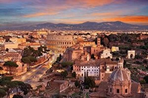 Images Dated 8th February 2022: Rome, Italy view towards the Colosseum with archeological areas at sunset