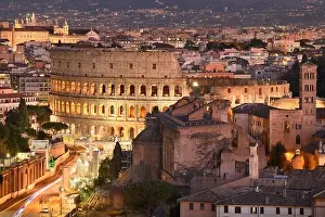 Rome, Italy view towards the Colosseum with archeological areas at sunset