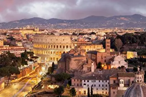 Rome, Italy view towards the Colosseum with archeological areas at sunset