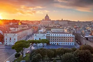 Rome, Vatican City. Aerial cityscape image of Vatican City with the Saint Peter Basilica, Rome, Italy during beautiful sunset