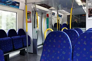 Public Transportation Prints: Ronninge, Sweden - July 12, 2018: Interior of a Stockholm commuter train class X60 in service for SL