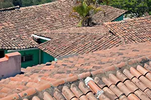 Latino Prints: Roofs of Spanish style clay tiles on houses in Santa Lucia, Honduras