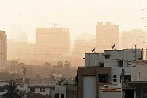 Residential District Prints: The rooftops of the buildings with a hazy smog of the skyline of suburb of Kandivali in the city of Mumbai
