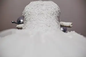 Veil Prints: the room hangs a white wedding dress