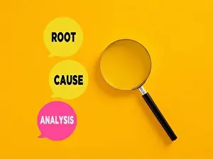 Investigate Prints: Root cause analysis concept written on speech bubbles with magnifying glass
