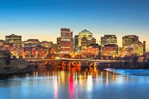 Rossyln, Arlington, Virginia, USA downtown city skyline at dusk on the Potomac River