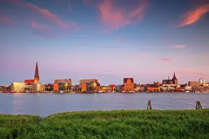 Rostock Prints: Rostock, Germany. Cityscape image of Rostock riverside with St