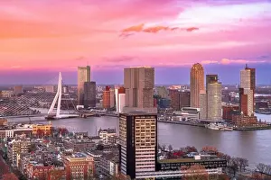 Rotterdam, Netherlands, city skyline over the Nieuwe Maas River at twilight