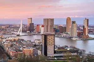 Rotterdam, Netherlands, city skyline over the Nieuwe Maas River at twilight