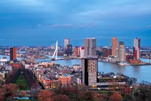 Rotterdam, Netherlands, city skyline over the Nieuwe Maas River at twilight