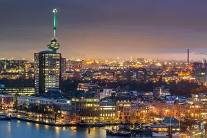 Rotterdam, Netherlands cityscape on the Nieuwe Maas River at night