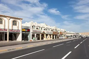 Emirate Prints: Row of shops in the city of Al Ain, UAE