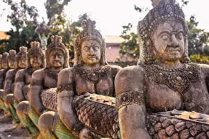 Khmer Prints: Row of warrior statues carrying a giant serpent