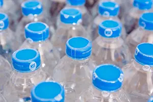 Bottled Prints: Rows of water plastic bottles and cap seal NSF us standard
