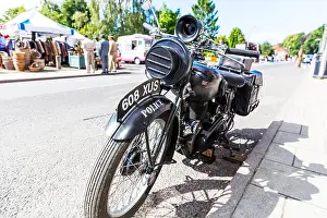Siren Prints: Royal Enfield police bike motorbike classic antique vintage siren on front parked on road UK England GB
