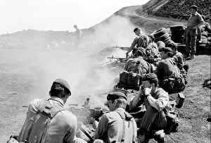 1982 Prints: Royal Marines Commandos test fire their machine guns on Ascension Island prior to the Falklands Conflict in 1982