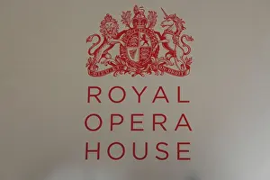 Royal Opera House sign, crest at entrance as seen from Covent Garden