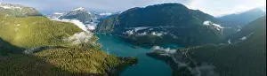 Rugged Landscape Prints: Rugged, forest-covered landscape surrounds Diablo Lake in North Cascades National Park