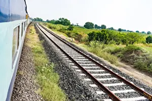 running train side view with railway track looking awesome