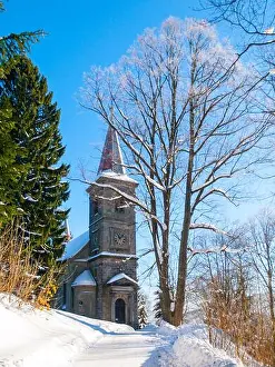 Czechia Prints: Rural church in rococo architectural style in winter time