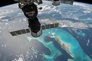 Bahamas Prints: The Russian Soyuz spacecraft frames the islands of the Bahamas surrounded by turquoise waters as seen