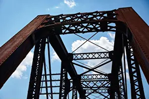 Grandeur Prints: Rusted Industrial Bridge Against Blue Sky, Abandoned Ohio Train Tracks