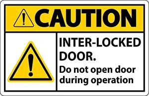 Safety sign caution Interlock doors do not open door during operation