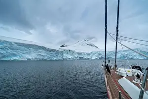 Inspiring Prints: sailing boat in Antarctica, yacht navigation through icebergs and sea ice