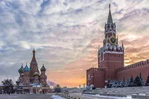 Cupola Prints: Saint Basil's Cathedral and Spasskaya tower in Red Square and colorful sky at winter morning