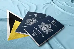 Citizenship Prints: Saint Lucia passport on the flag of Saint Lucia, Caribbean countries