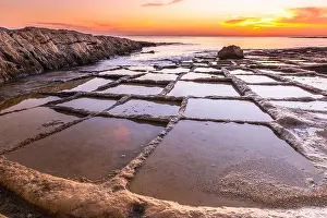 Salt Pan Prints: Salt pans at beach in Marsaskala, Malta at sunrise