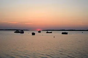 Nightfall Prints: Salzhaff, Baltic Sea in Mecklenburg, last sun and some boats on the water