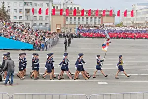 Samara, Russia - May 9: Russian woman midshipmans march at the parade on annual Victory Day