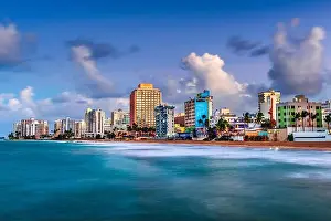 San Juan, Puerto Rico resort skyline on Condado Beach on dusk