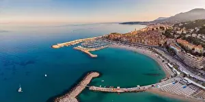 Lamppost Prints: Sand beach beneath the colorful old town Menton on french Riviera