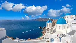 Santorini island, Greece. Incredibly panoramic romantic summer landscape on Santorini. Oia village in the morning light. Amazing view with white house
