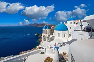 Santorini island, Greece. Incredibly panoramic romantic summer landscape on Santorini. Oia village in the morning light. Amazing view with white house