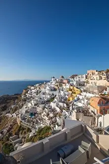 Santorini island, Greece. Incredibly romantic summer landscape on Santorini. Oia village in the morning light. Amazing view with white houses. Island