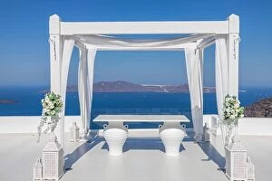 Images Dated 26th July 2021: Santorini Island, Greece. Wedding decoration on a popular couple destination