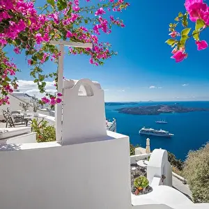 Fira Prints: Santorini island, Oia, Greece. Traditional famous white architecture flowers under sunny weather over Caldera