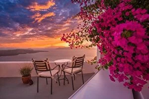 Images Dated 23rd July 2021: Santorini island sunset. Caldera view with street and flowers, romantic mood