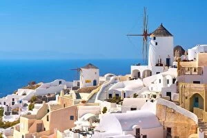 Images Dated 17th June 2011: Santorini Island - white houses and windmills on the blue sky, Oia, Greece
