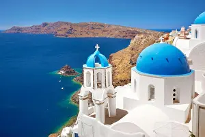 Place Of God Prints: Santorini landscape with greek bell tower and white church with blue dome overlooking the sea