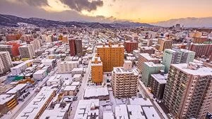 Images Dated 18th February 2017: Sapporo, Japan winter skyline view towards the mountain at dusk
