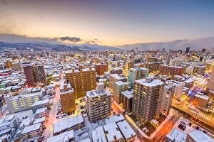 Images Dated 18th February 2017: Sapporo, Japan winter skyline view from the mountains at dusk
