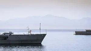 Berth Prints: The SAS Drakensberg fleet replenishment ship arrives at the Simons Town naval base along South Africa's Western
