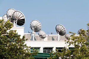 Communicating Prints: Satellite dishes on an office roof