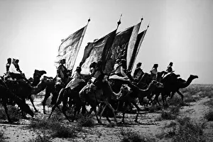 Saudi Arabian Prints: Saudi Arabia: Muslim warriors of Ibn Saud on camel back in Nejd